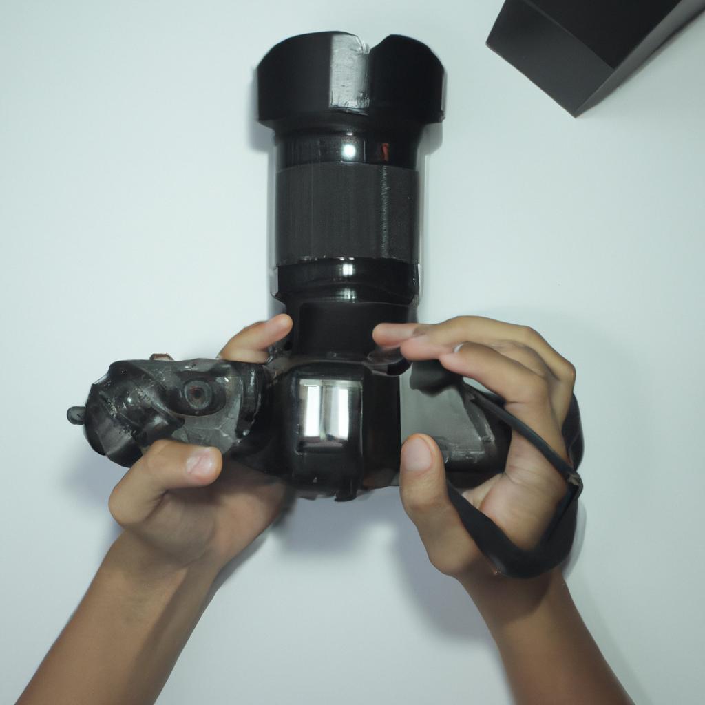 Person holding film camera equipment